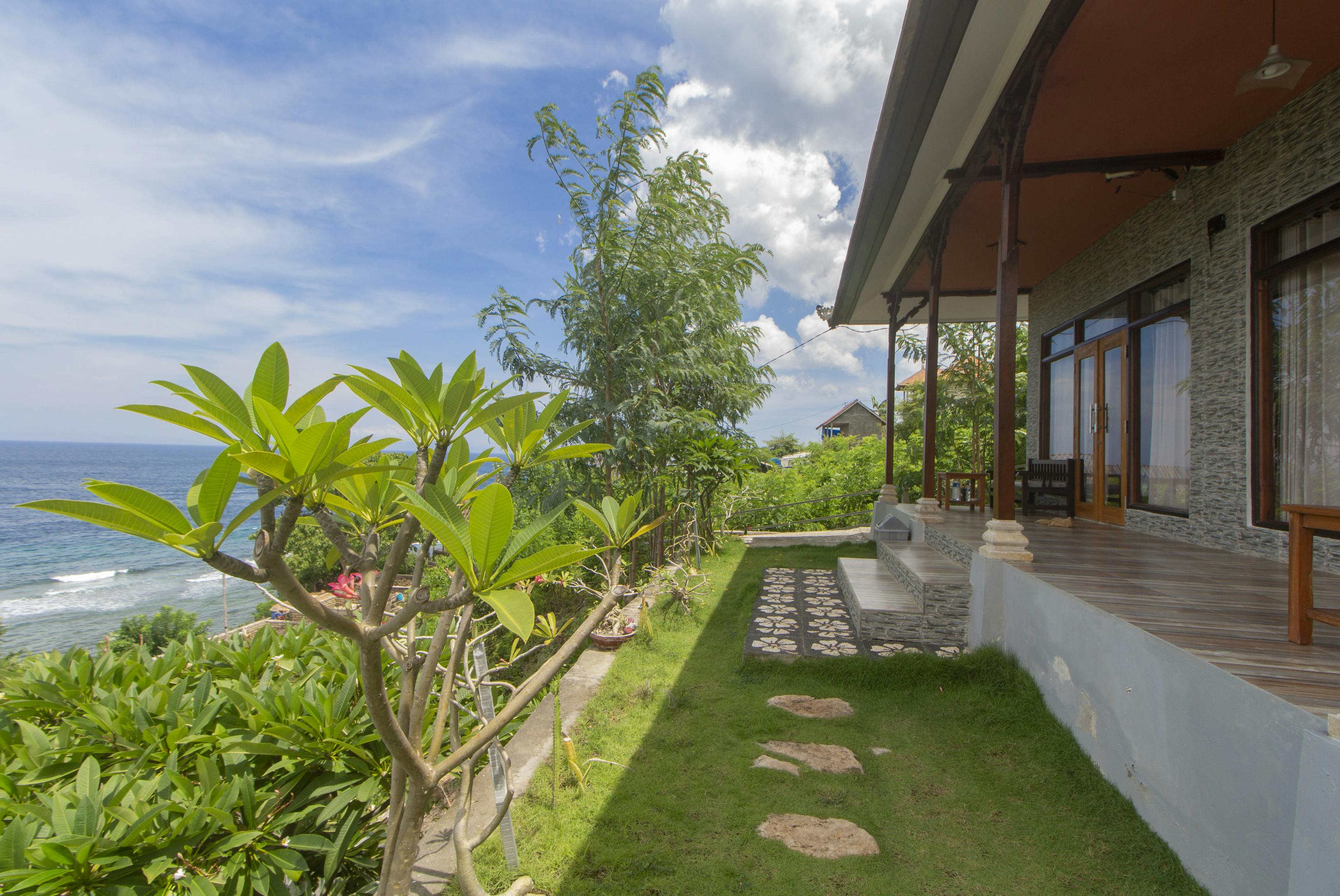 Property renovation : The room terrace before we installed bean bag chairs and umbrella