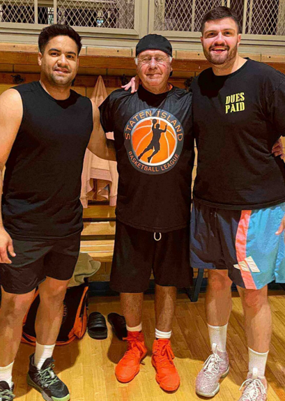 A group of men posing for a picture

Description automatically generated with medium confidence