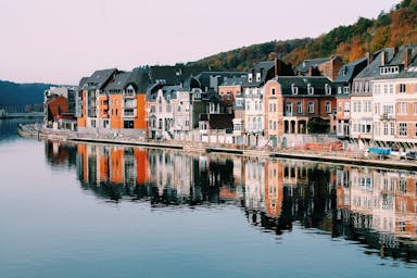 assorted-color of houses near lake