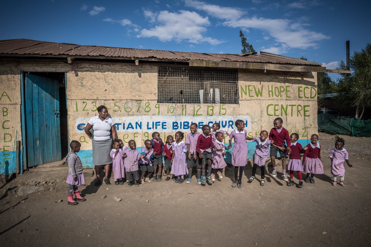 Beneficiary - School Kids in Front of School.jpg