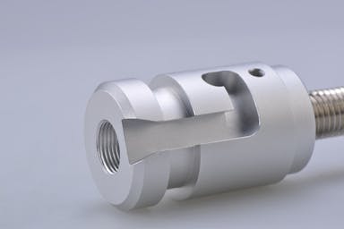 gray metal pipe on white background