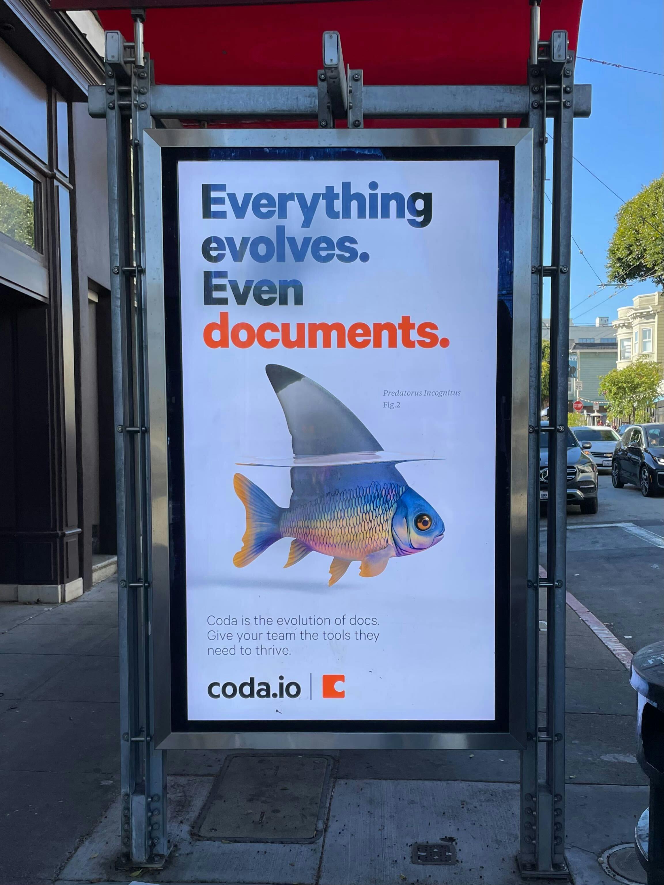 A billboard on a bus stop in San Francisco - Predatorus Incognitus, a friendly fish with a sharkfin