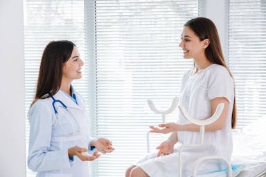 gynecologist-working-with-patient-in-clinic.jpg