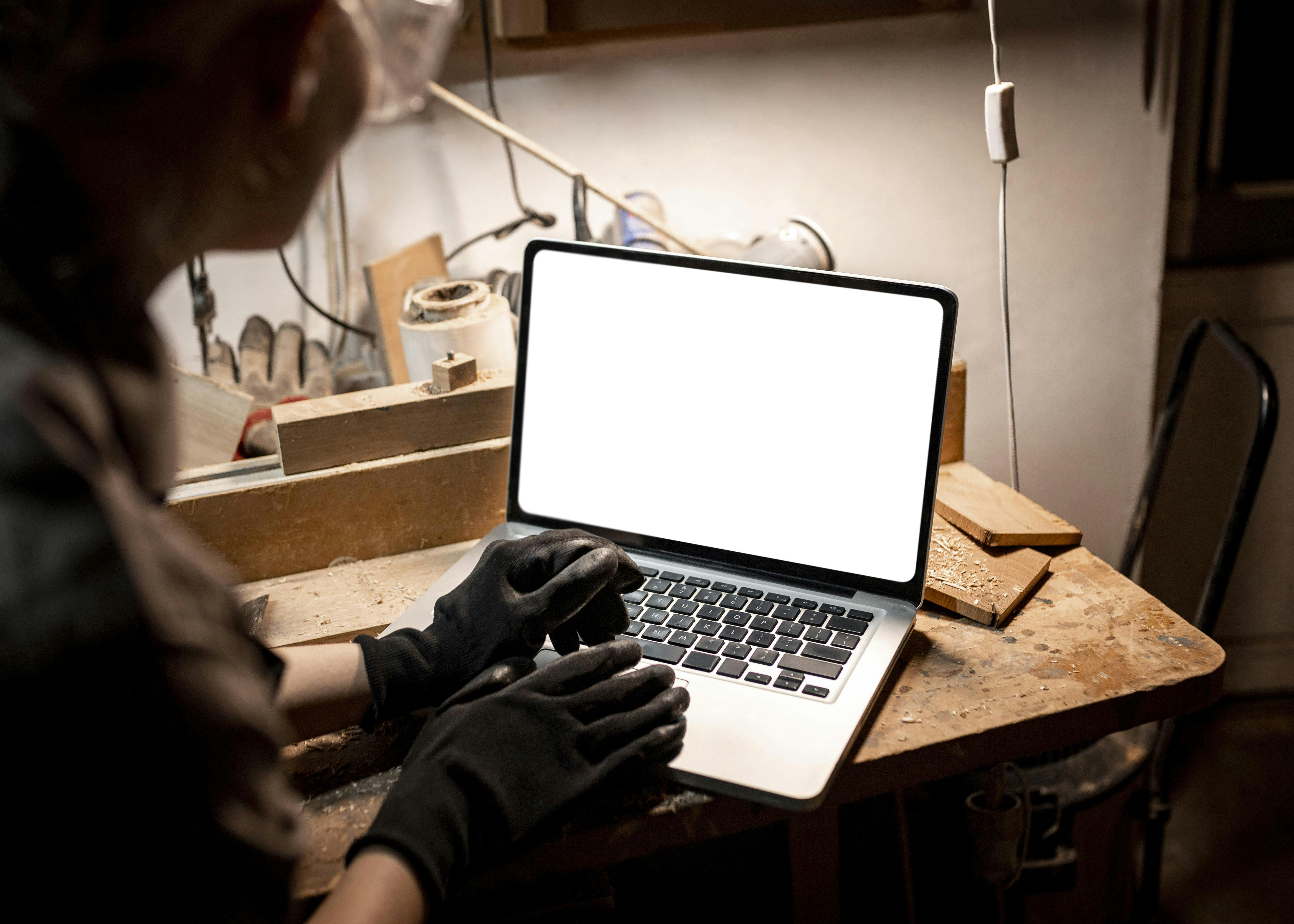 high-angle-female-carpenter-using-laptop.jpg