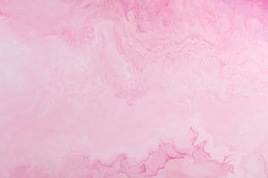 a pink and purple background with a white border
