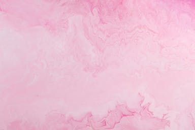 a pink and purple background with a white border