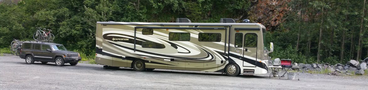 RV with Jeep in Alaska.jpg