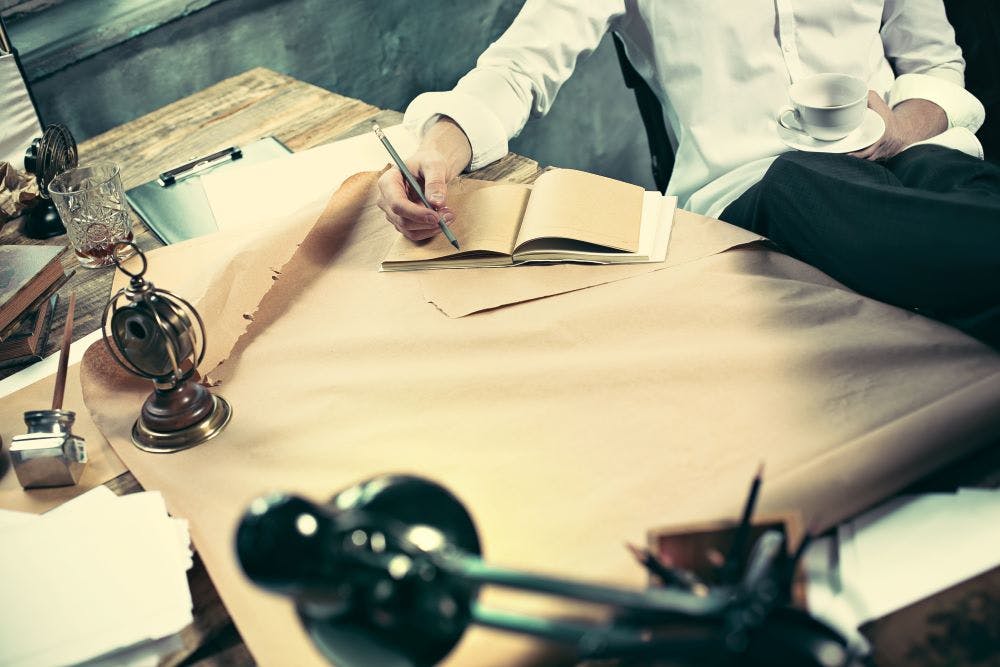 architect-working-drawing-table-office.jpg