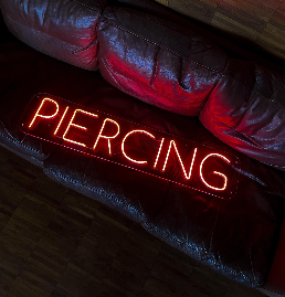 Neon signage Piercing.PNG