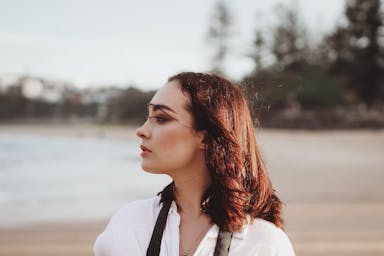 woman in white collared shirt