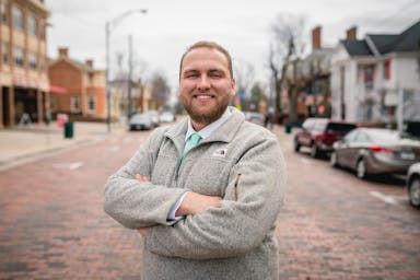 man wearing grey jacket