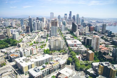 aerial photography of high-rise building under white and blue sky