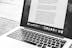 silver MacBook showing application