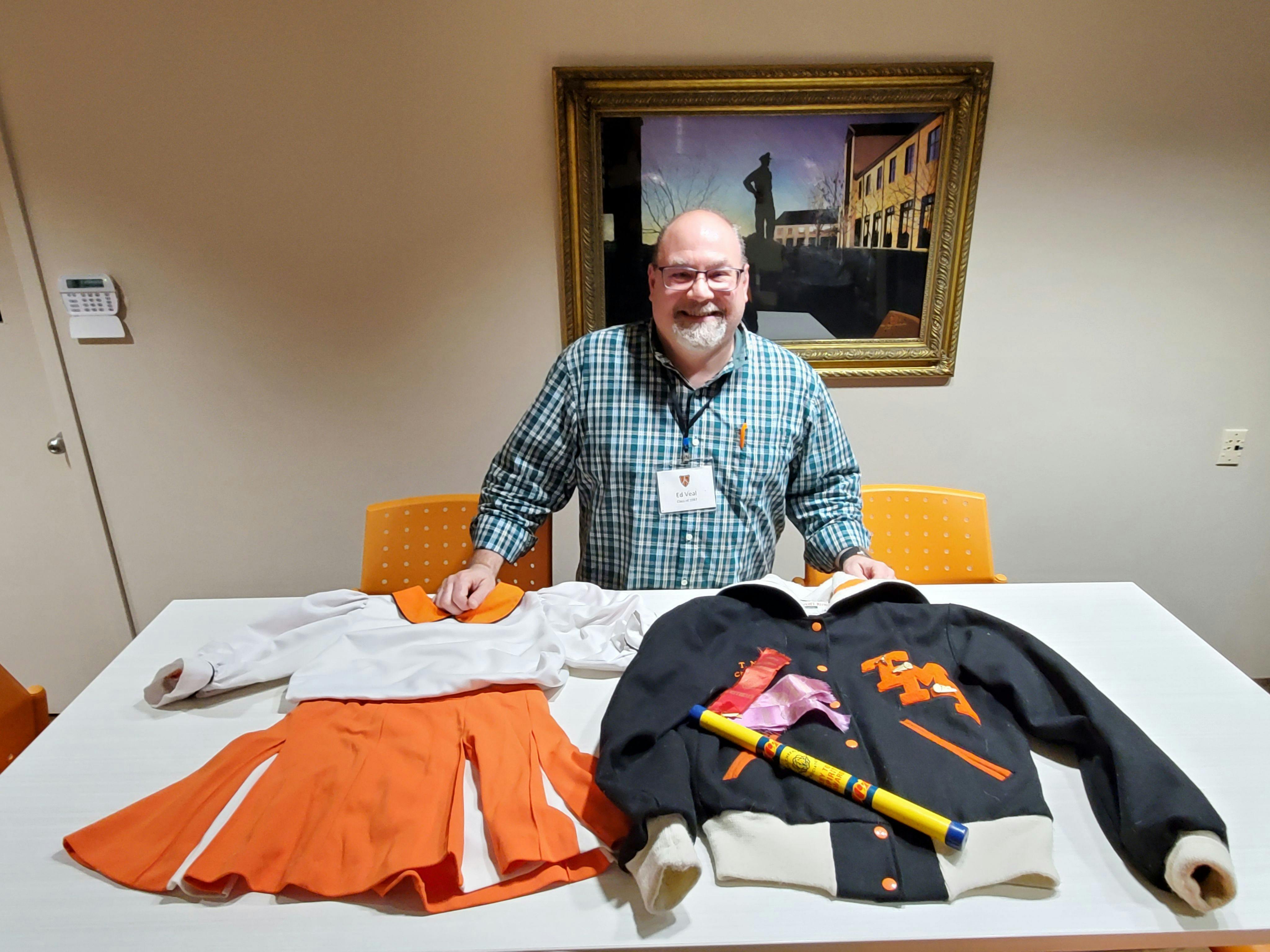 Ed Veal '87 with cheer gear from Mary Veal '89.jpg