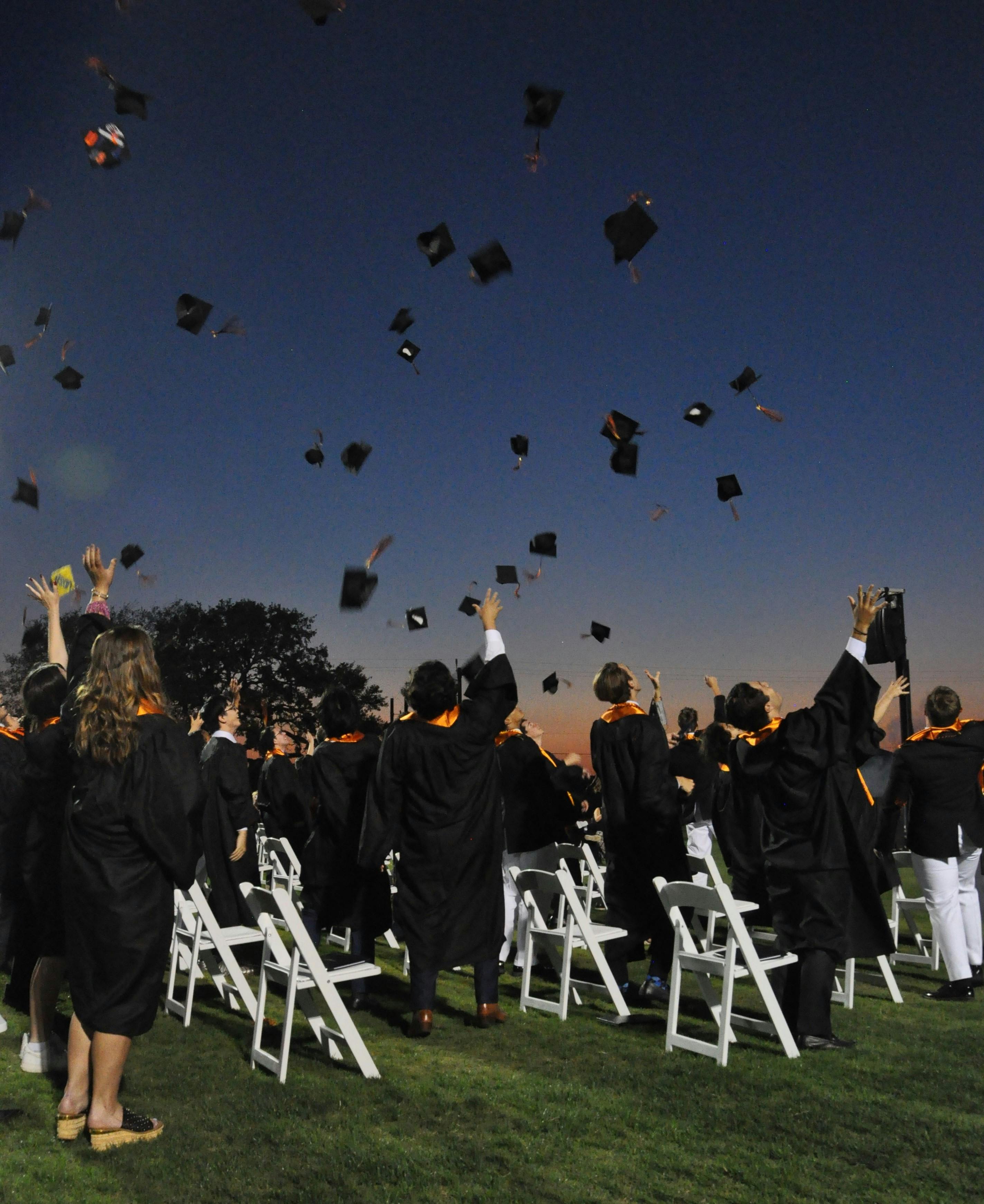 Graduation 2021 hats in the air.jpg