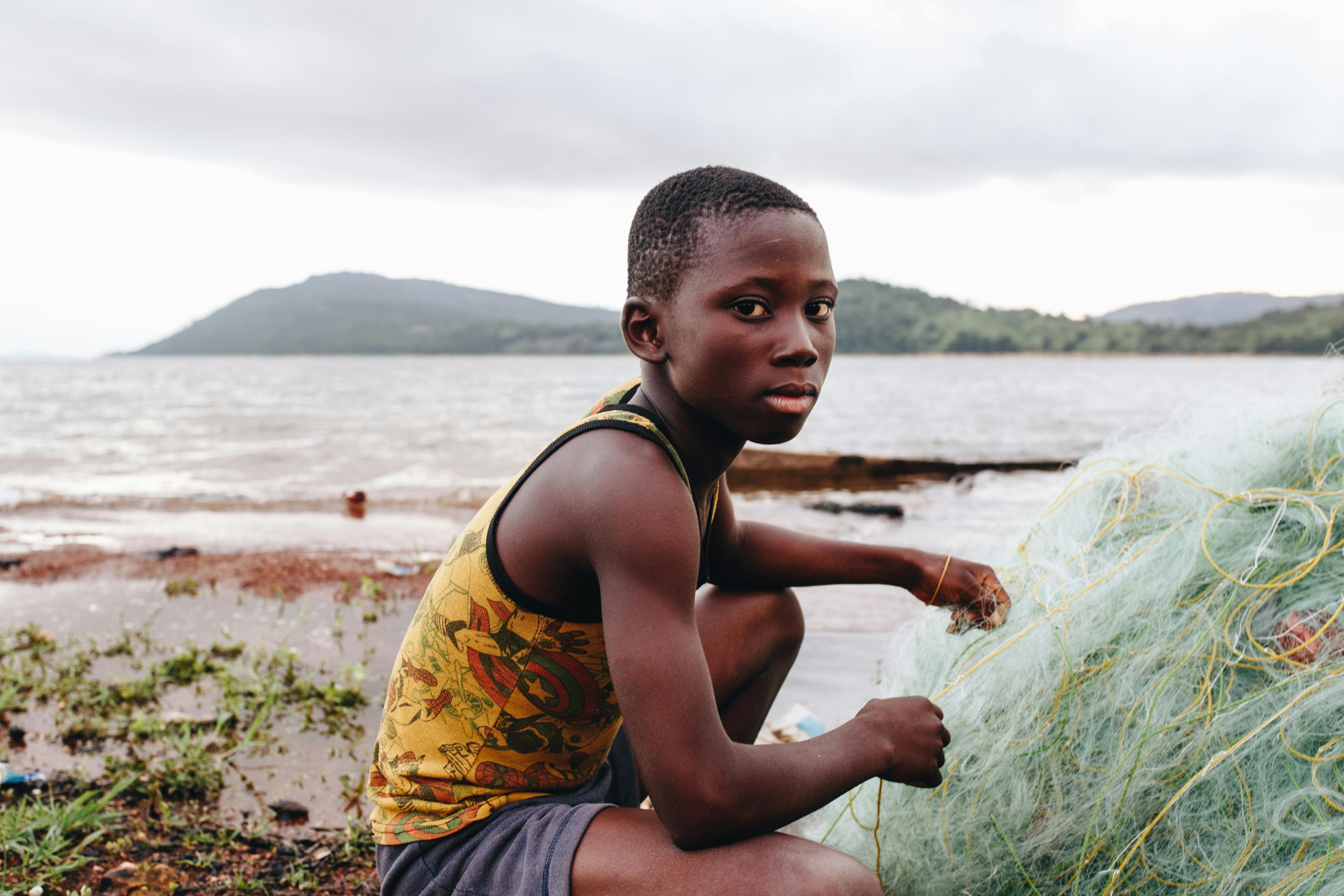 123-60.jpg_201907ACC-Ghanaian Children on Lake Stock Photos_Approved for Full Use.jpg