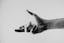 grayscale photo of persons hand