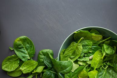 green leaves on white ceramic bowl
